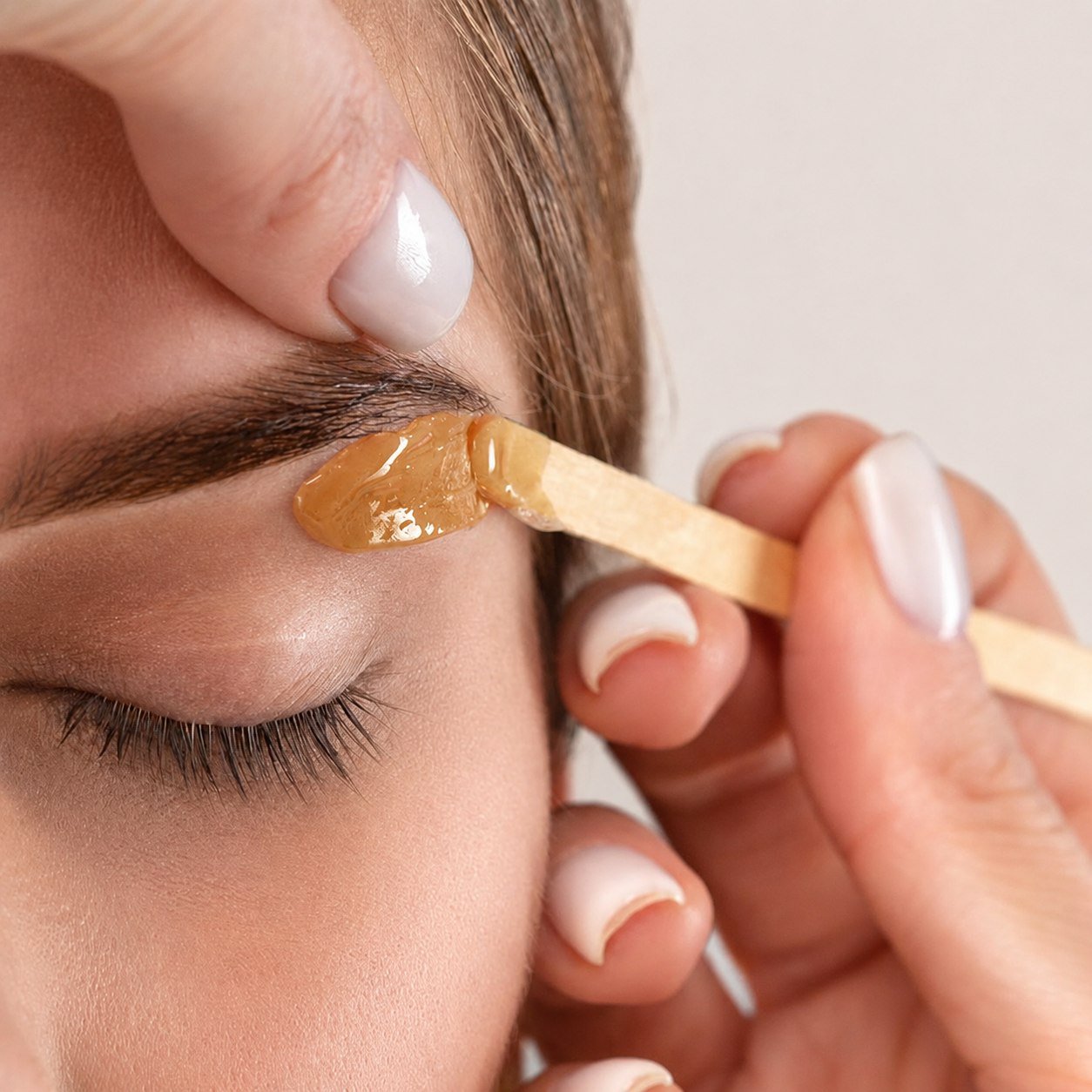 Eyebrow waxing and tinting technique training at Nove Academy